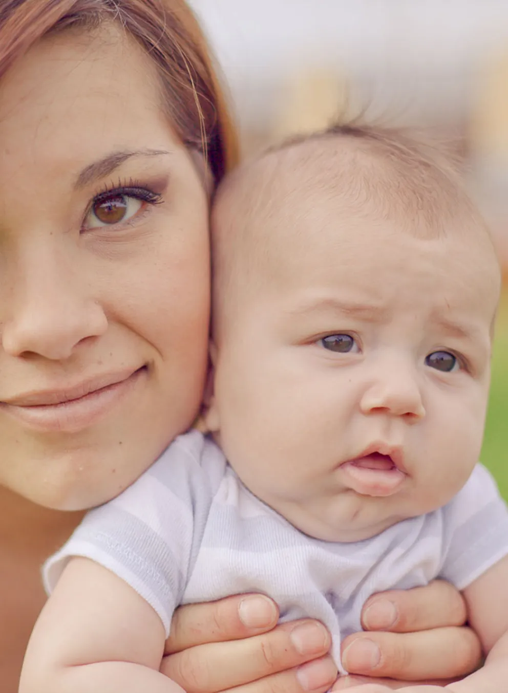 mother holding her baby
