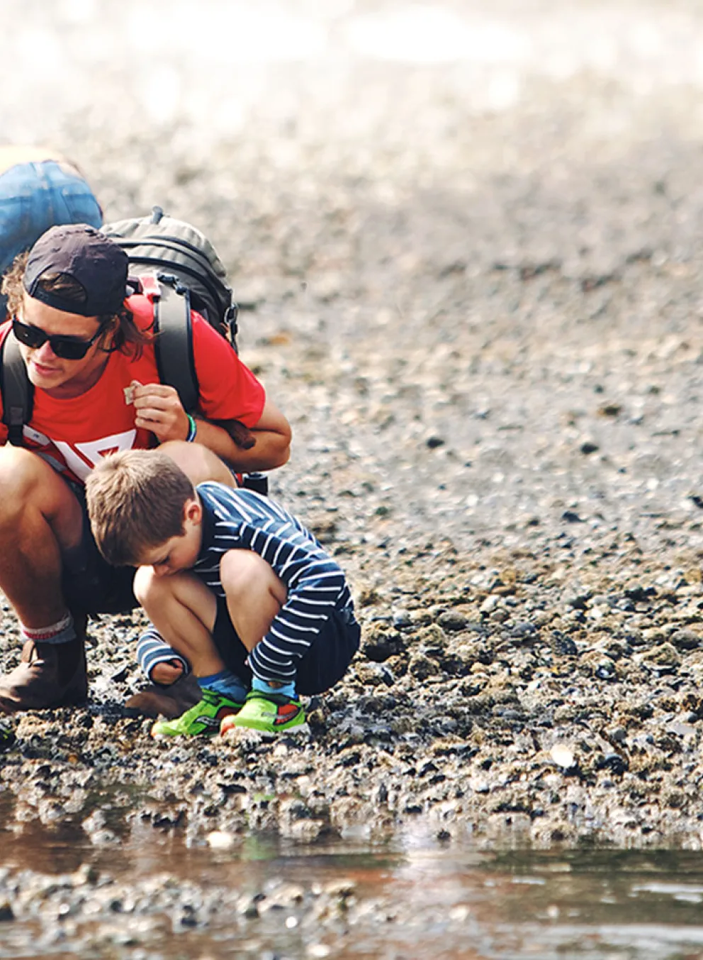 Y camp leader exploring nature with children