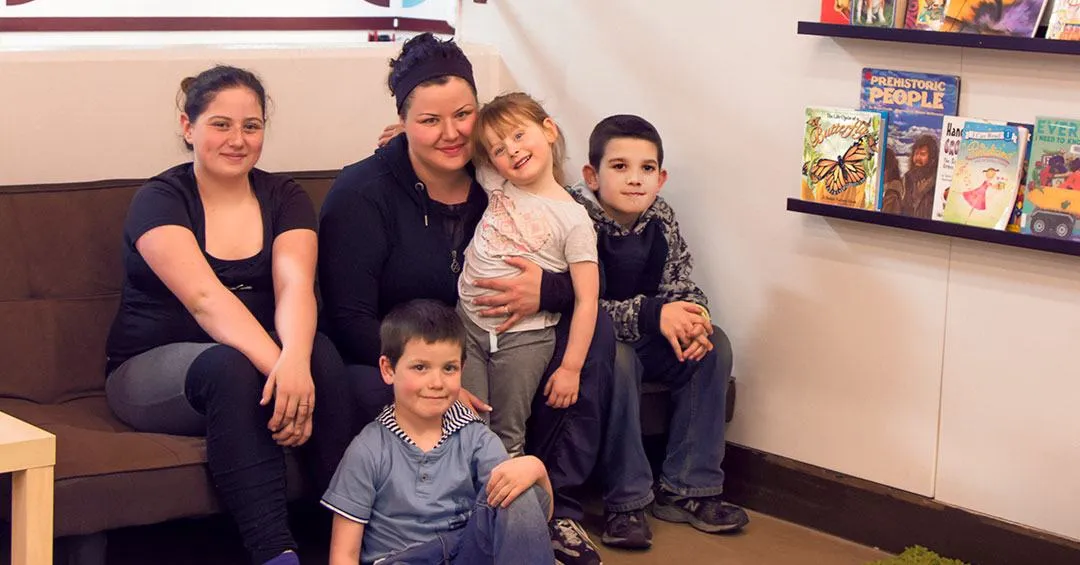 Danni and Children in YMCA Beyond the Bell reading area
