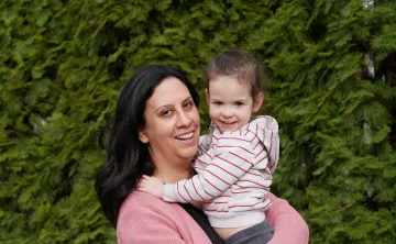 Woman holding child